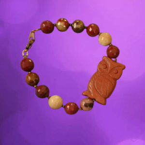 Armband in herfsttinten met een uil.